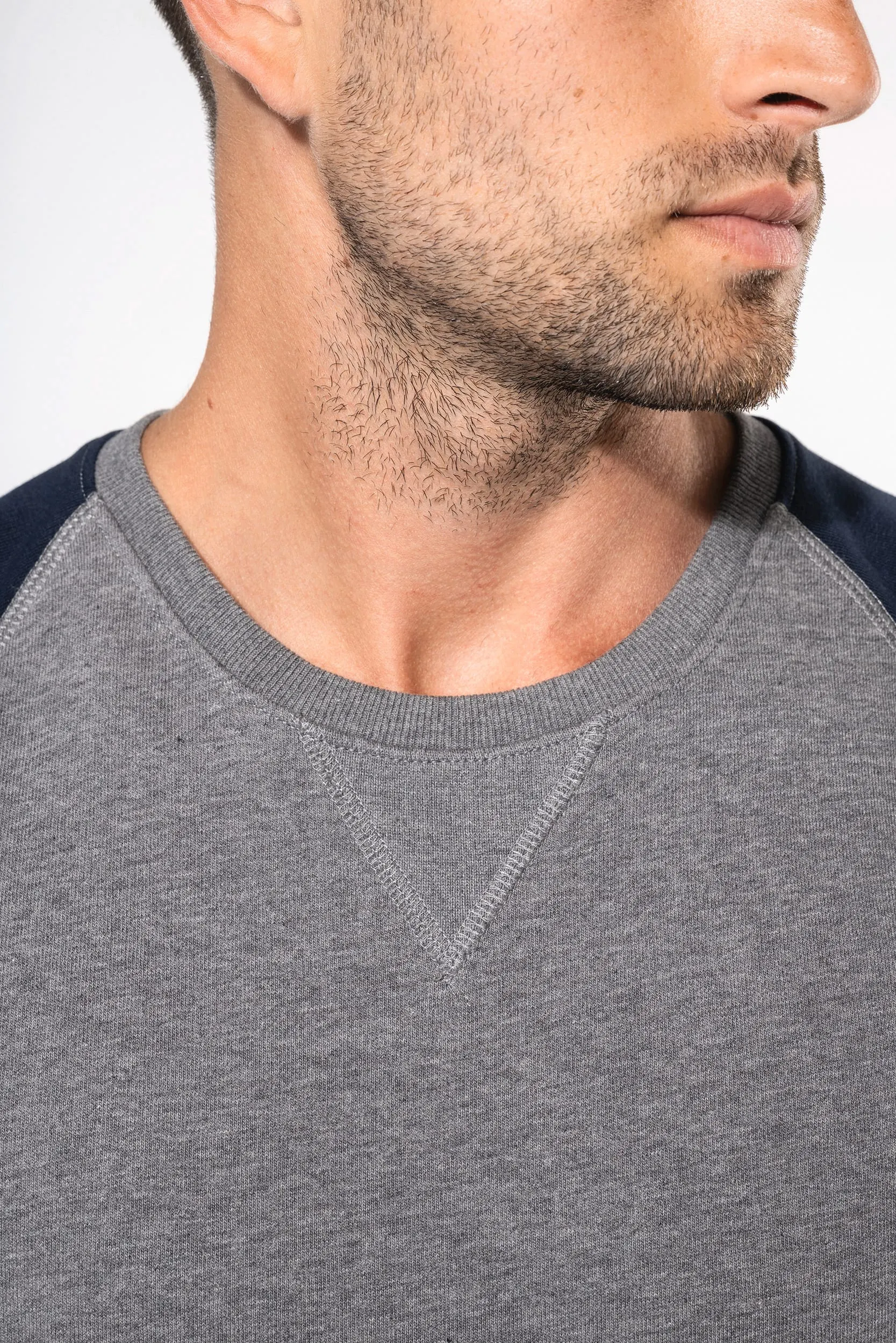 Sudadera bicolor algodón orgánico French Terry cuello redondo mangas raglan hombre