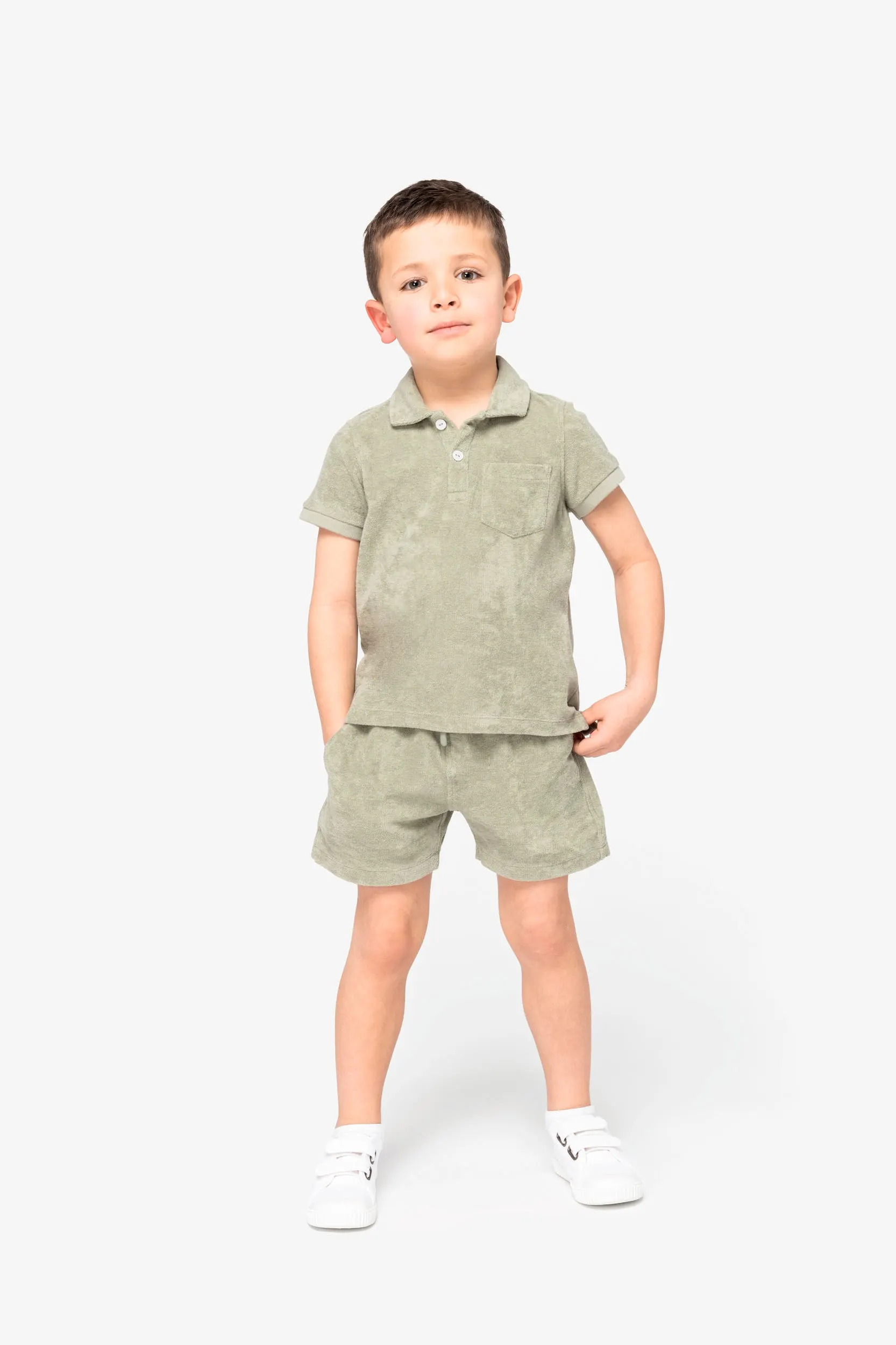 Polo ecorresponsable de rizo niño