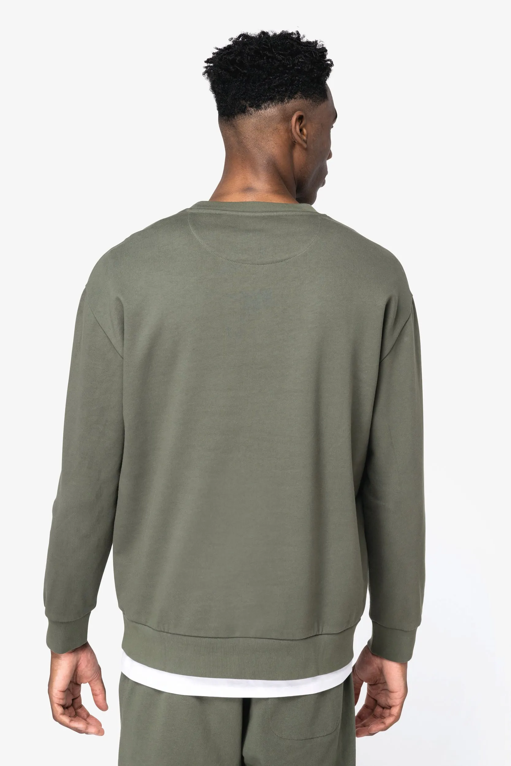 Sudadera ecorresponsable cuello redondo y hombros caídos felpa perchada unisex