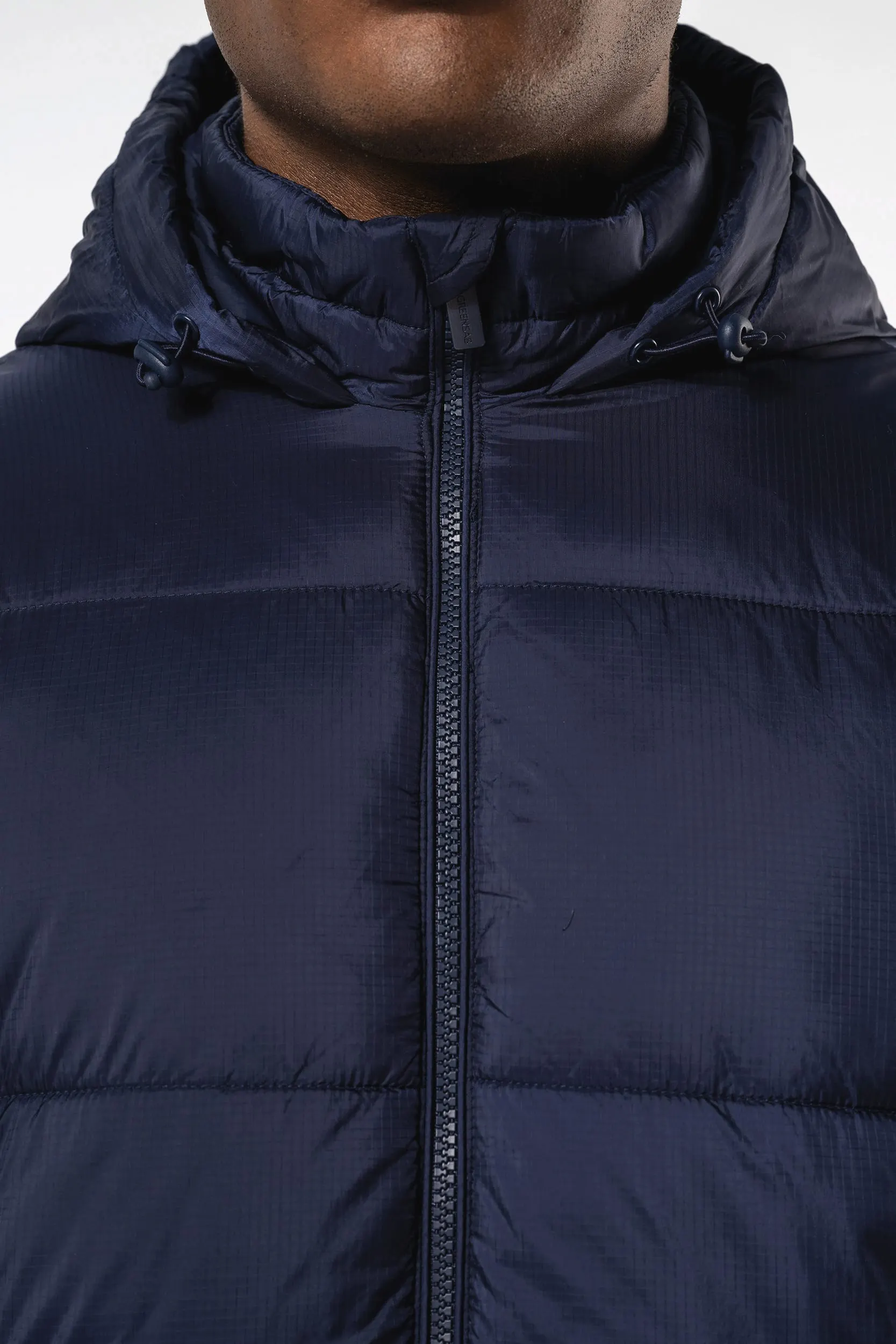 Chaqueta ripstop reciclada con capucha unisex