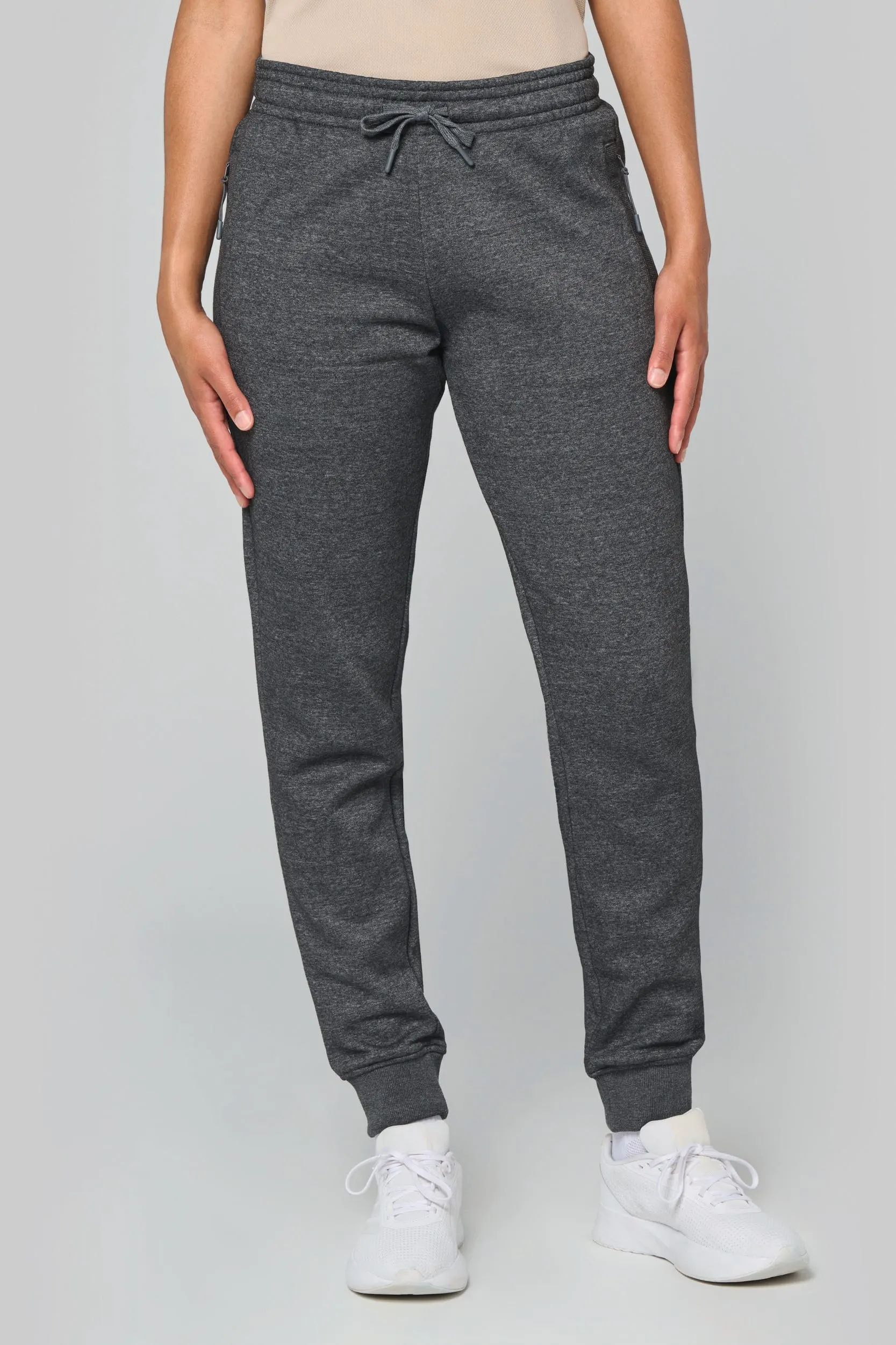 Pantalón de chándal multideporte con bolsillos adulto