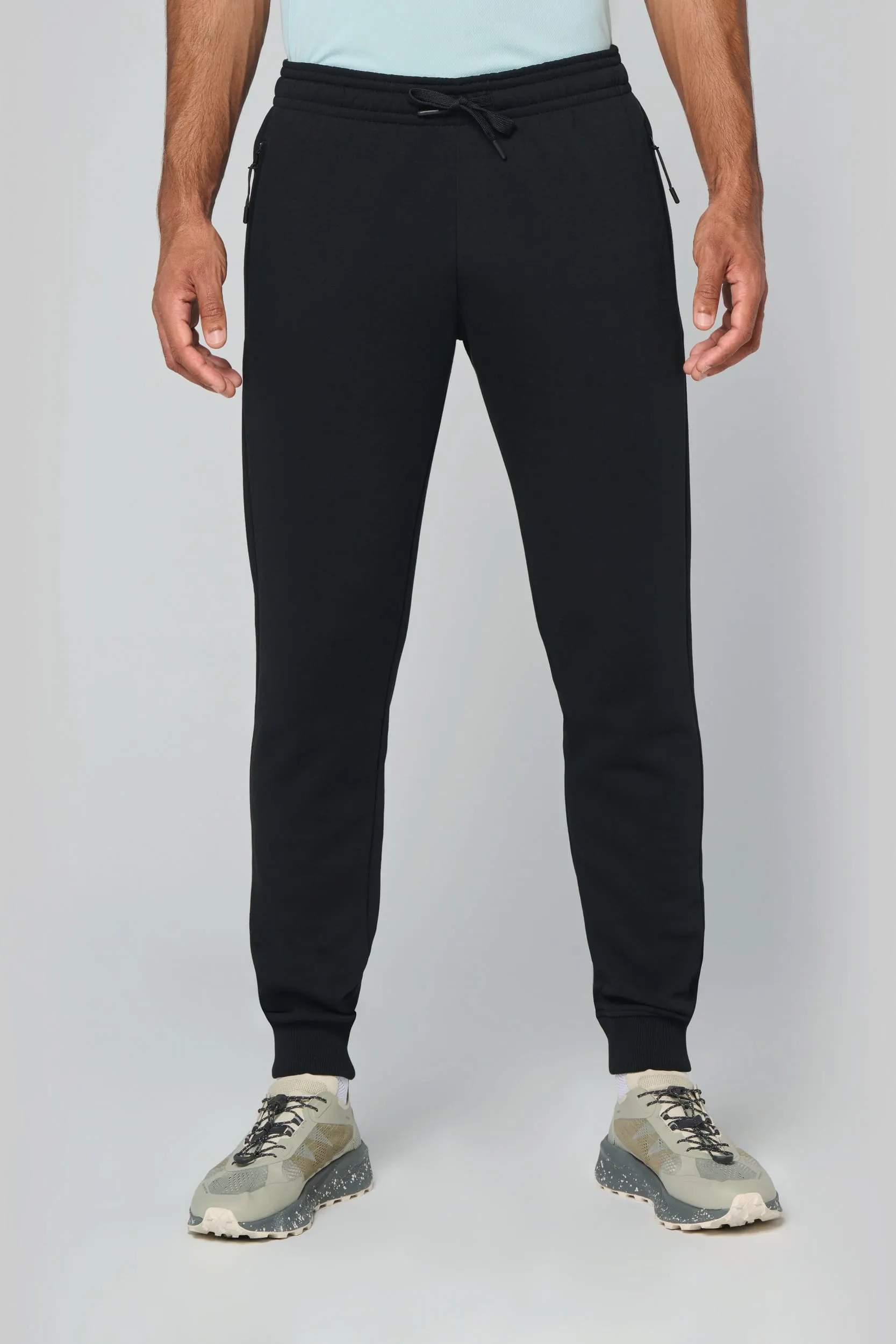 Pantalón de chándal multideporte con bolsillos adulto