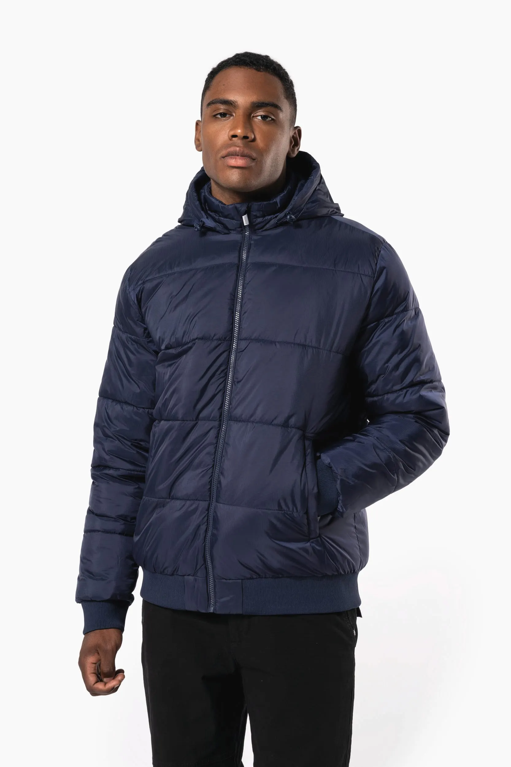 Chaqueta ripstop reciclada con capucha unisex