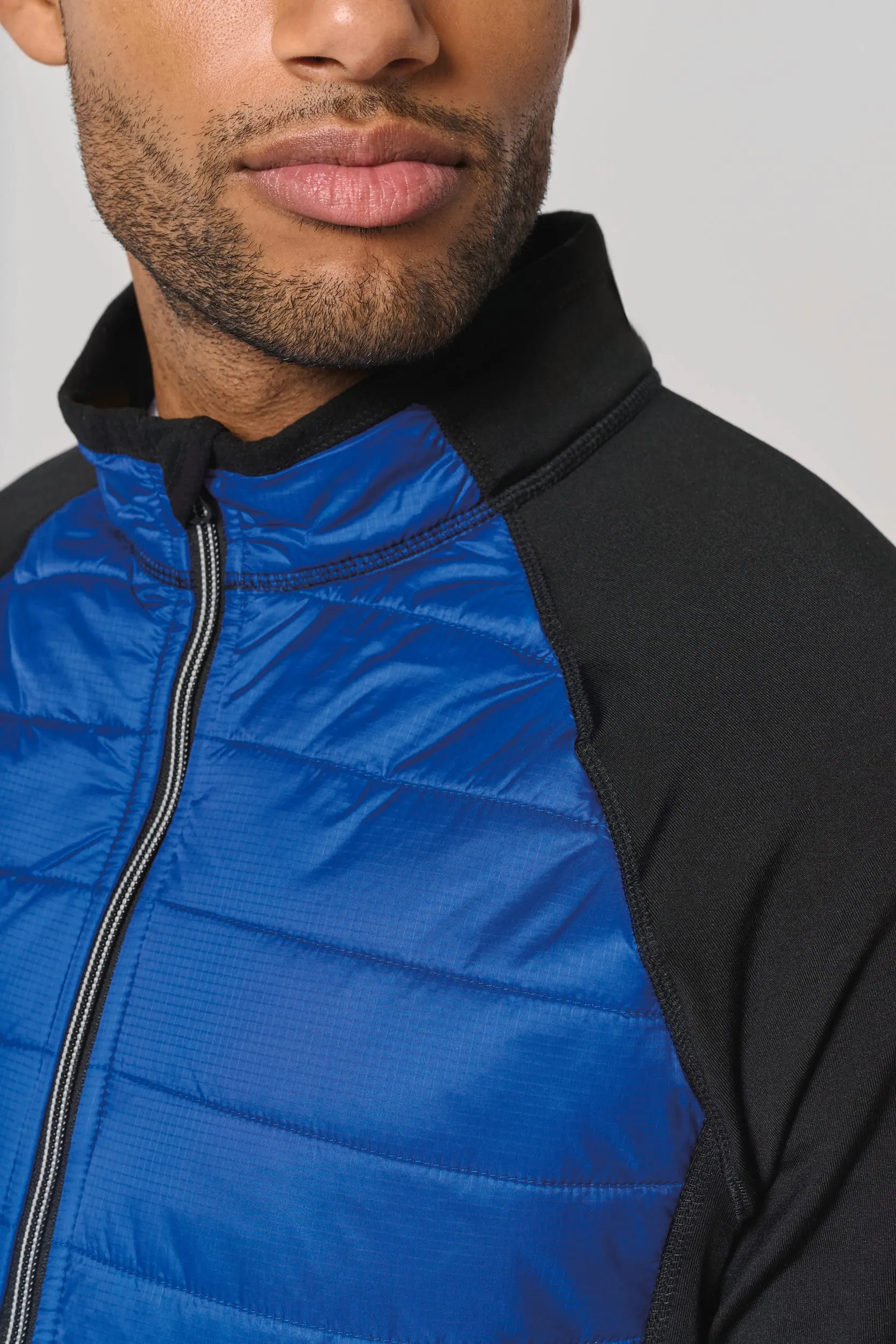 Chaqueta de deporte bimaterial unisex