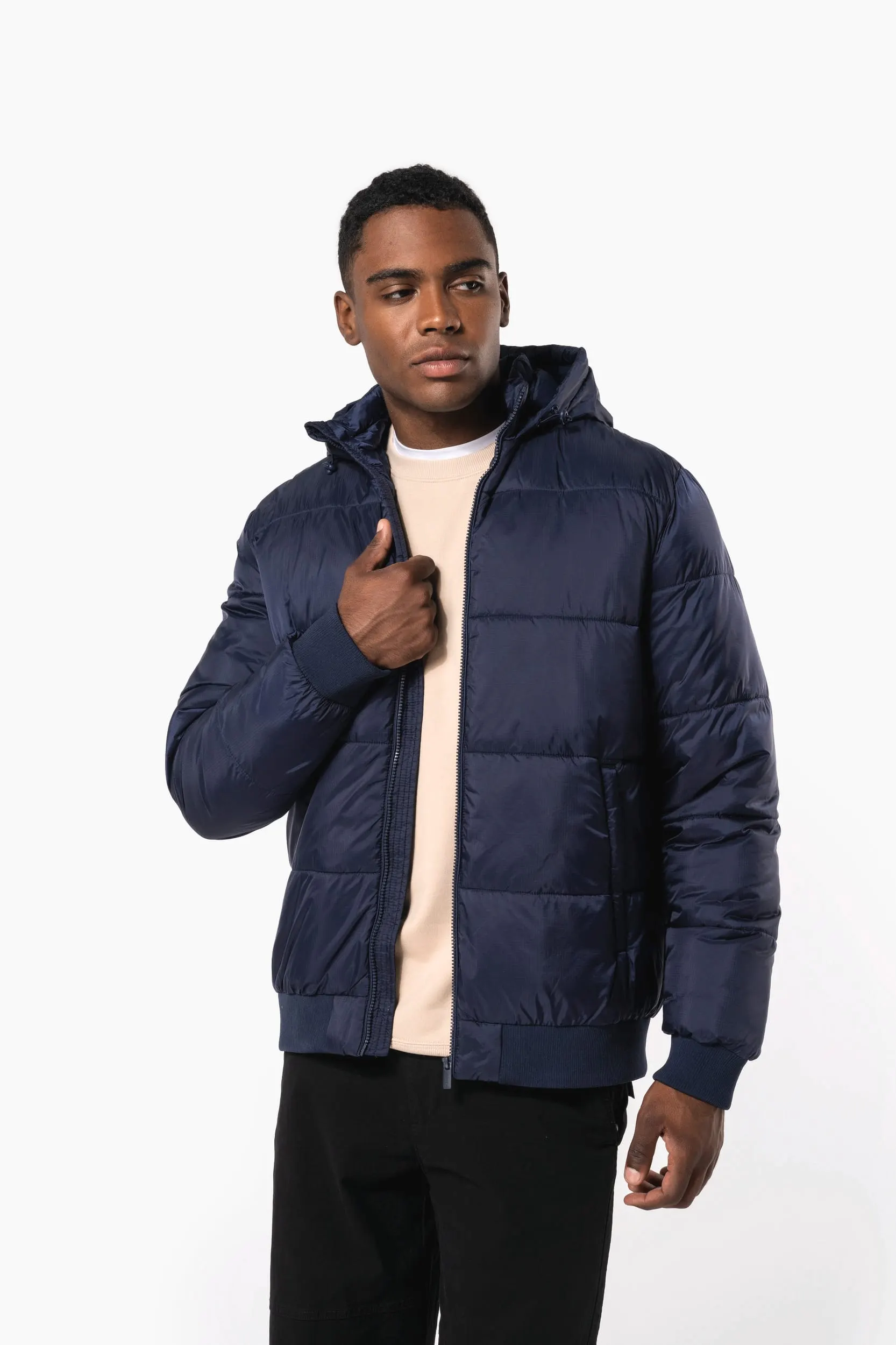 Chaqueta ripstop reciclada con capucha unisex
