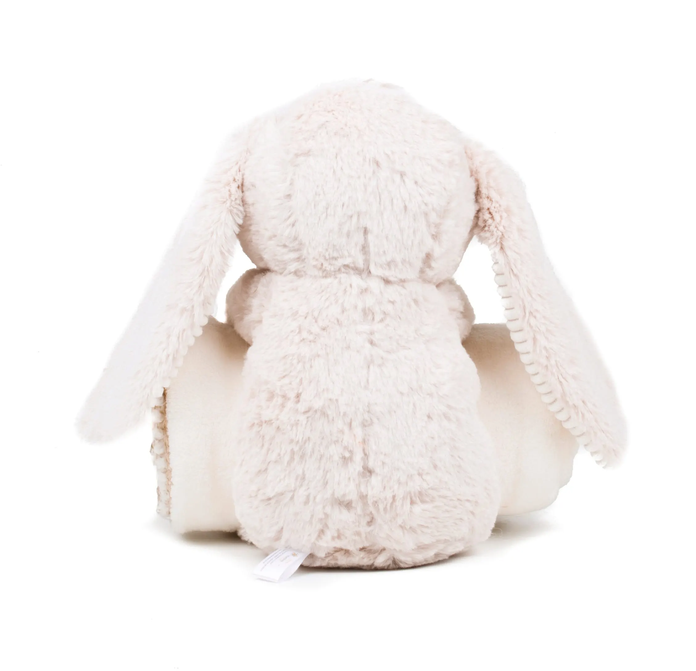 Conejo de peluche y manta