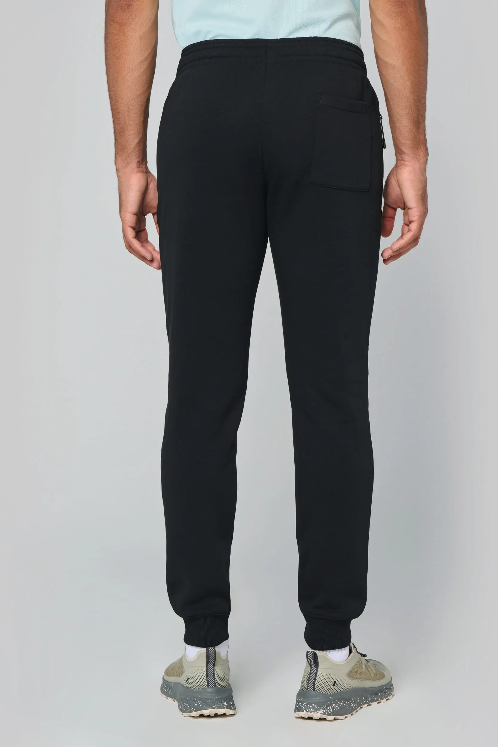 Pantalón de chándal multideporte con bolsillos adulto