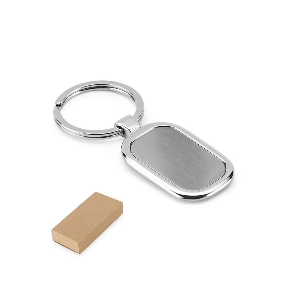 ZABEL. Llavero de metal para doming
