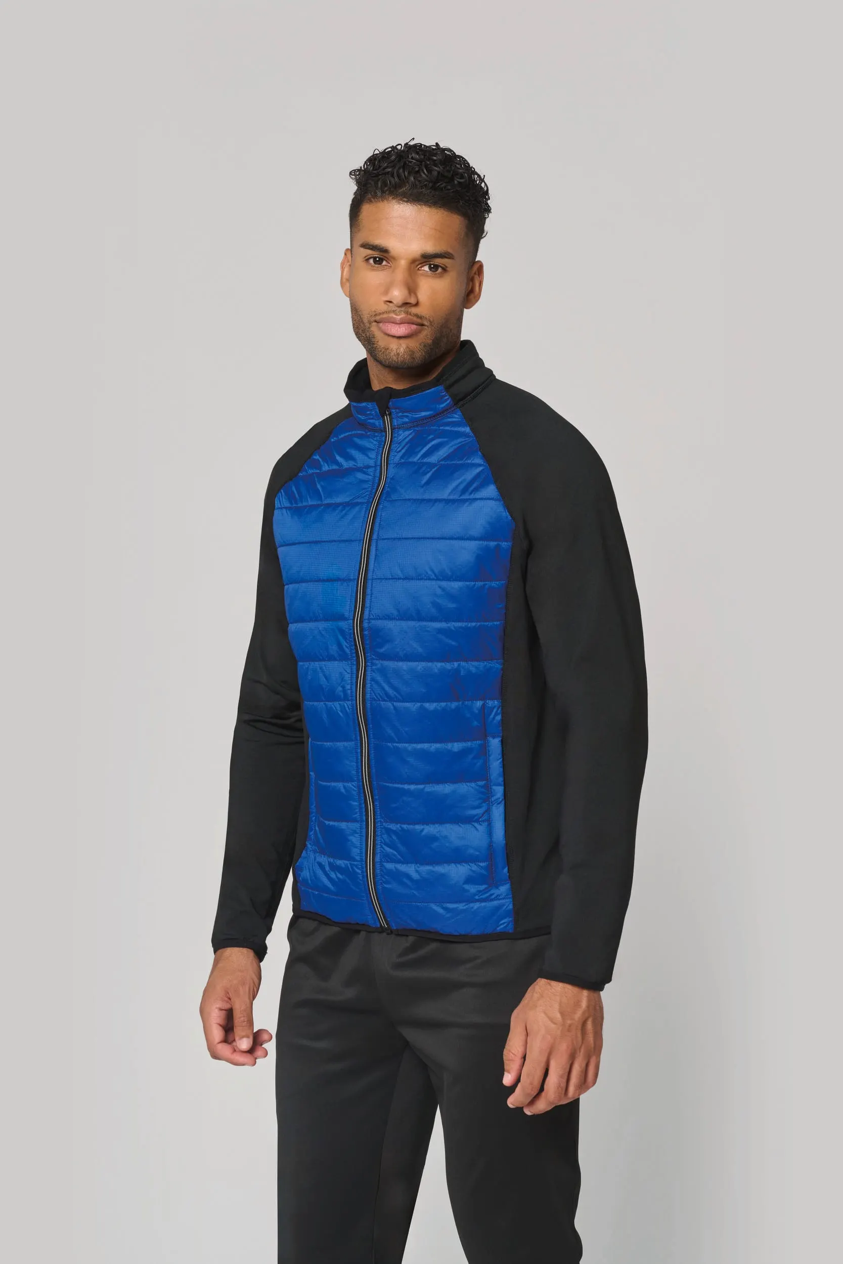 Chaqueta de deporte bimaterial unisex