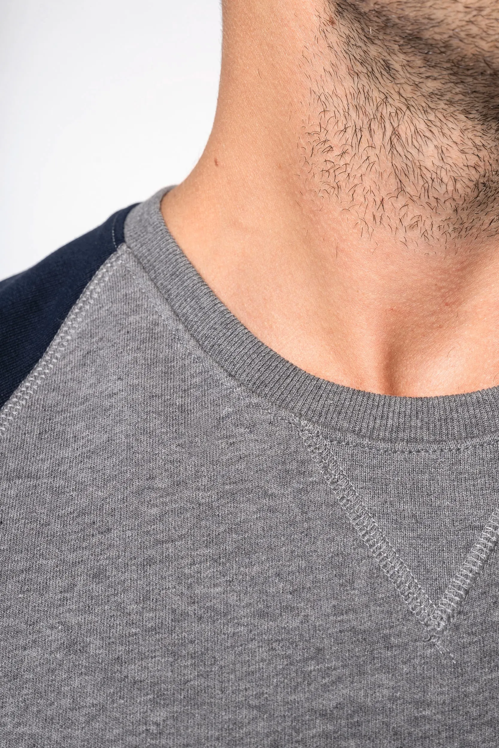 Sudadera bicolor algodón orgánico French Terry cuello redondo mangas raglan hombre