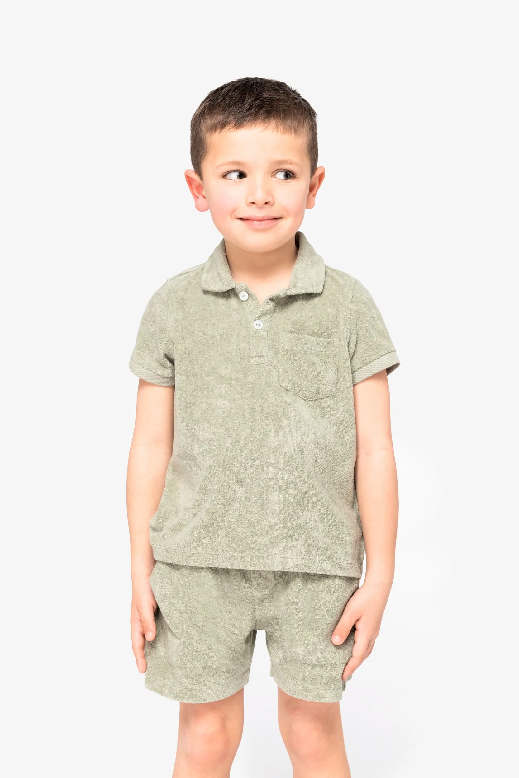Polo ecorresponsable de rizo niño