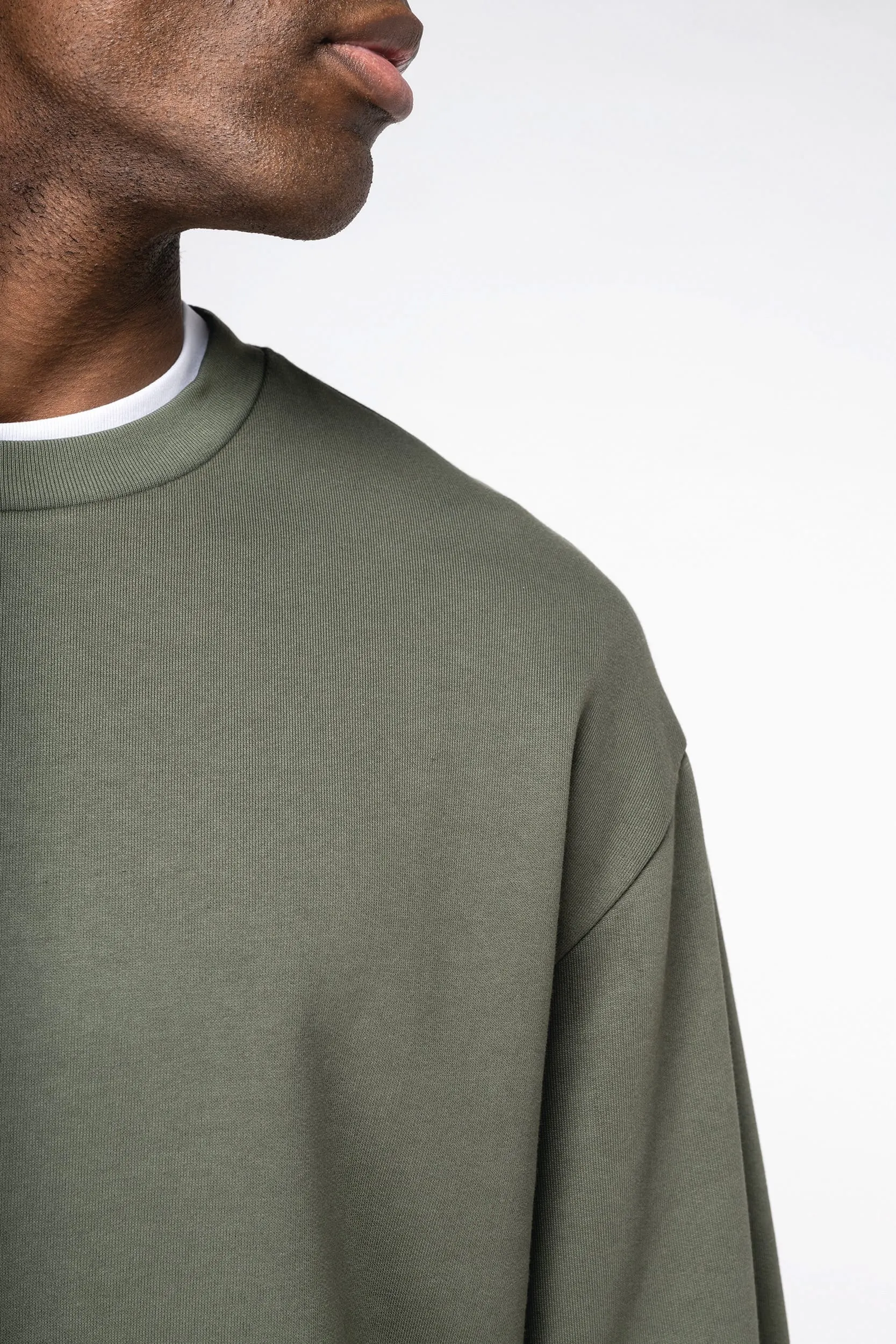 Sudadera ecorresponsable cuello redondo y hombros caídos felpa perchada unisex