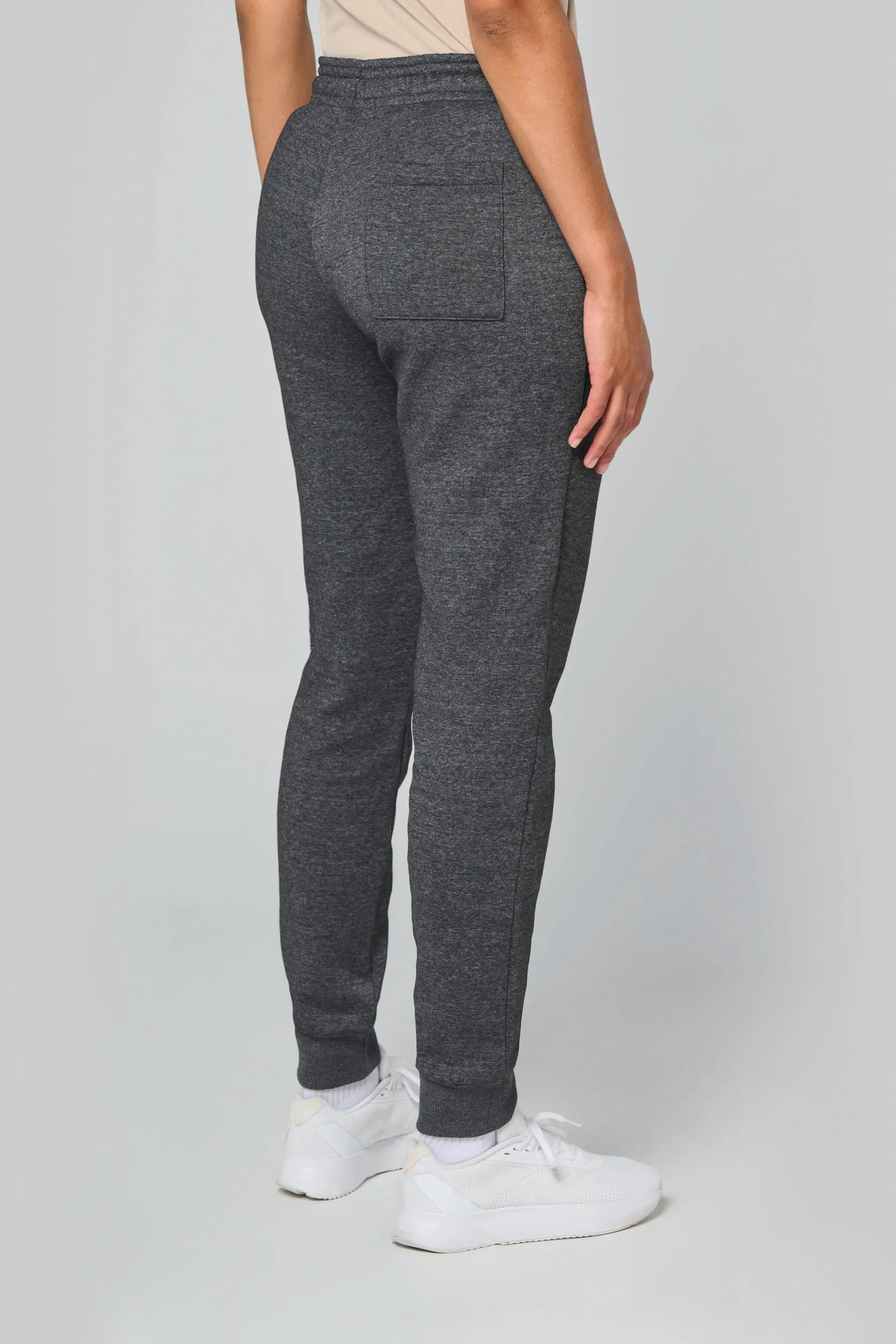 Pantalón de chándal multideporte con bolsillos adulto